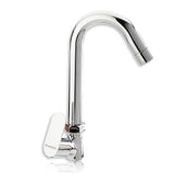 A silver kitchen sink tap with a chrome finish and a lever on the side.