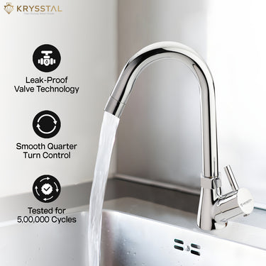 A modern kitchen faucet in a chrome finish with a flat paddle handle is shown above a sink with running water, and text states it is tested for 500,000 cycles.
