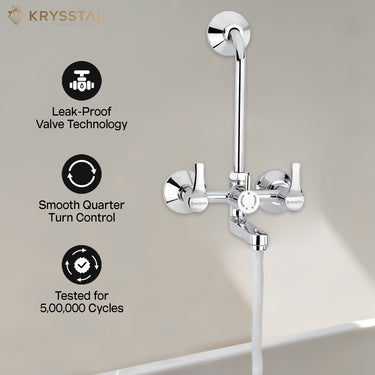 A dual-control chrome plumbing fixture that mounts on the wall, allowing separate regulation of water flow with its features like leakproof valve technology, smooth quarter-turn control, & testing for 500000 cycles.