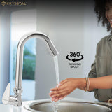 Sleek chrome faucet with a rounded gooseneck spout installed on a stainless steel sink, accompanied by feature 360 degree rotating spout show while washing the hand.