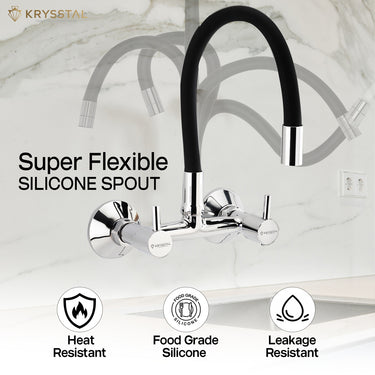 Dual-control chrome kitchen mixer tap with a Super flexible spout in a zig-zag shows on the backdrop, mounted on the wall above the sink with 3 features on the bottom.