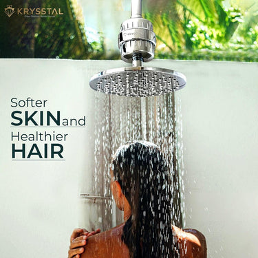 A silver and white hanging water filter showering the water on a bathing lady, & the "softer skin & healthier hair" tagline on the left side.