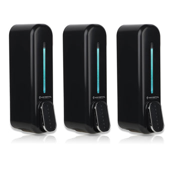 Three black wall mount soap dispensers with a visible blue line indicating the soap level, branded by Krysstal.