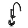 Black piano kitchen sink faucet with hand shower on a white background.