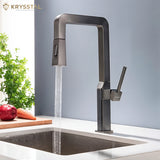 Modern kitchen faucet with water flowing into a sink, Krysstal brand visible on a light blue background