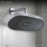 Boltz Overhead Rain Shower with Krysstal branding fitted on a tiled wall background