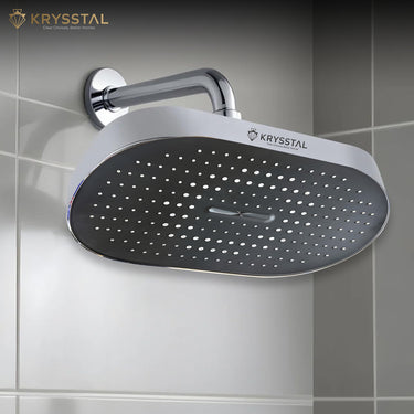 Boltz Overhead Rain Shower with Krysstal branding fitted on a tiled wall background