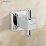 A silver square-shaped robe hook with a vertical rod extends from the square fitted on a beige background