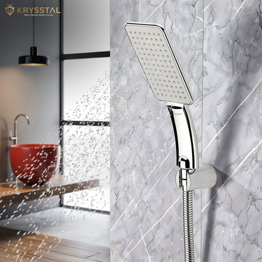 Breeze ABS hand shower with flowing water & 304-SS flexible shower tube (1 m) on a wall hook fitted on a grey tile.