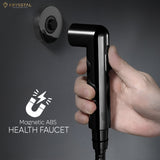 Black magnetic ABS health faucet with handheld sprayer and flexible shower tube, showing magnetic wall-mount connection.