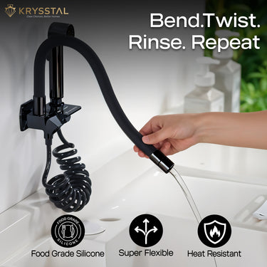 Black kitchen faucet with handheld flowing water into the sink and its 3 features at the bottom with a piano finish on a white transparent backdrop.