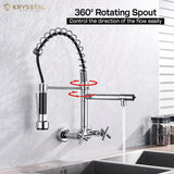 A silver kitchen faucet with 360° rotating spout on a marble countertop.