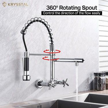 A silver kitchen faucet with 360° rotating spout on a marble countertop.