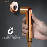 Rose gold colored handheld health faucet with a magnetic ABS shower tube and wall hook.