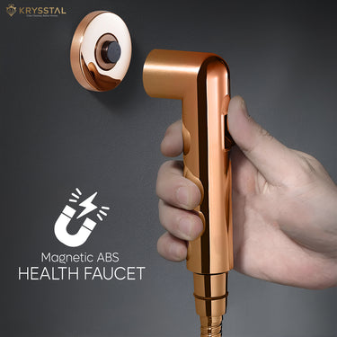 Rose gold colored handheld health faucet with a magnetic ABS shower tube and wall hook.