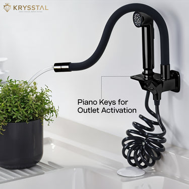 A black faucet with a hand shower attachment is shown while watering the pot, and there is a piano design on a white background.