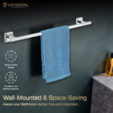 A blue towel hanging on a stainless steel towel cube rod with mounting brackets on the green wall with 2 features showing on the left side with a written tagline on the bottom.