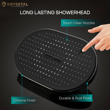 Black overhead rain shower with touch clean nozzles and a hand pointing to it, on a dark background.