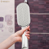 A Silver ABS Hand-holding Shower with Flexible Shower Tube (1 m) on a purple and white background