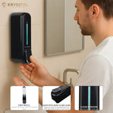 Person using a black soap dispenser in a bathroom setting below the highlighted features.