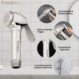 Diamond Brass Handheld shower with Krysstal branding, highlighting features on a bathroom background.