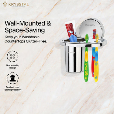Silver stainless steel toothbrush holder with 3 toothbrush and 1 paste inside it & showing 2 benefits on left side mounted on white and red texture wall