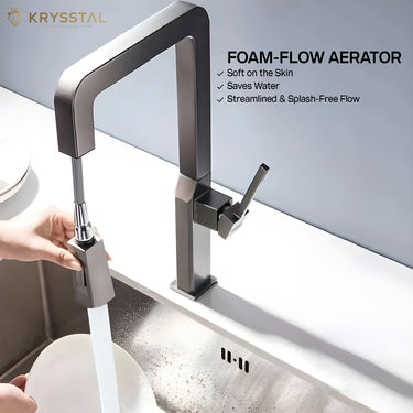 Krysstal foam-flow aerator faucet in a kitchen setting with water flowing.