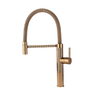 A rose gold kitchen sink mixer tap with a flexible hose and a pull-out sprayer.
