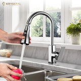 Silver-colored faucet aerator with hand-held pulling features showing while washing the apple, designed for kitchens.
