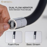 A hand-held Black flexible kitchen faucet with dual flow aerator like foam flow & basic stream on a light background.